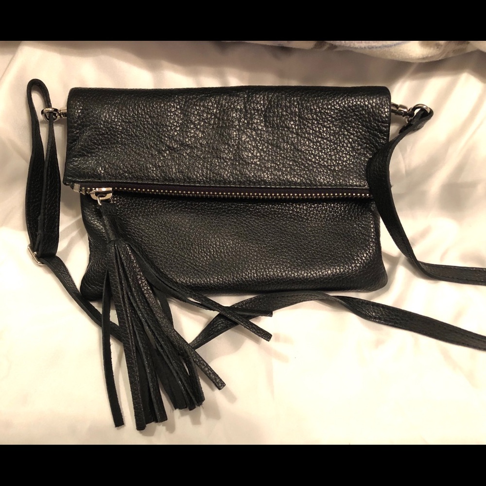ROOTS fold over soft leather bag